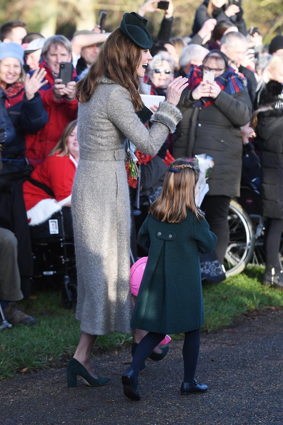 George and Charlotte delighted well-wishers who lined the route surrounding the 16th-century church to catch a glimpse of the royal family. Following the church service, the royals greeted eager fans to wish them a merry Christmas.