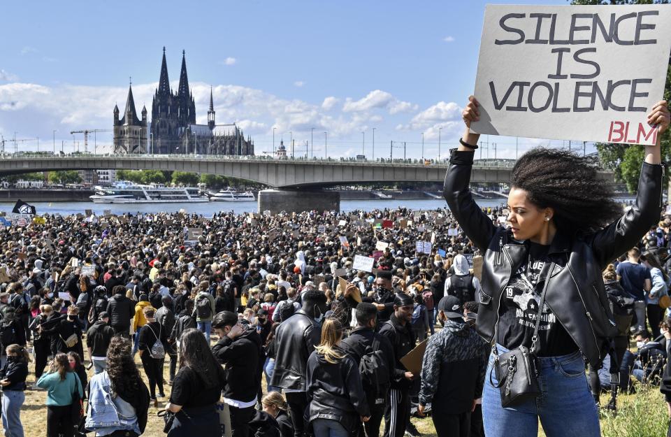 Thousands of people demonstrate in Cologne, Germany, Saturday June 6, 2020, to protest against racism and the death of George Floyd by police officers in Minneapolis. (AP Photo/Martin Meissner)