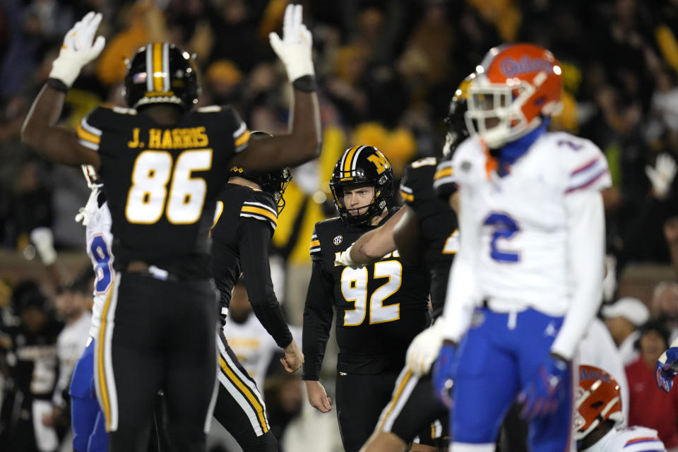 Missouri place-kicker Harrison Mevis (92) celebrates after making a 30-yard field goal late in the second half of an NCAA college football game against Florida Saturday, Nov. 18, 2023, in Columbia, Mo. Missouri won 33-31. (AP Photo/Jeff Roberson)