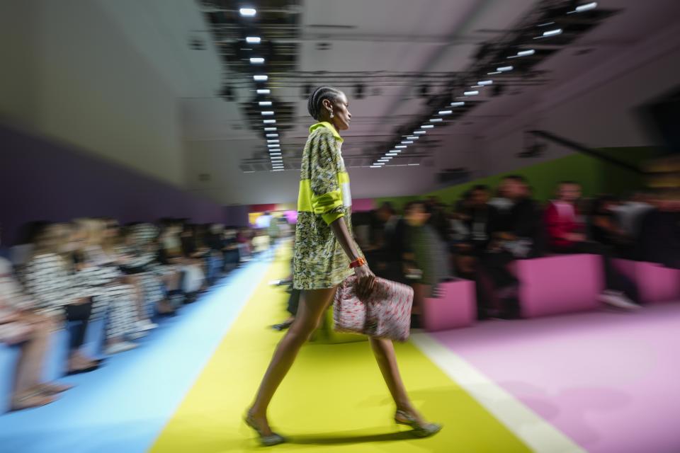 A model wears a creation as part of the Benetton women's Spring Summer 2024 collection presented in Milan, Italy, Thursday, Sept. 21, 2023. (AP Photo/Luca Bruno)