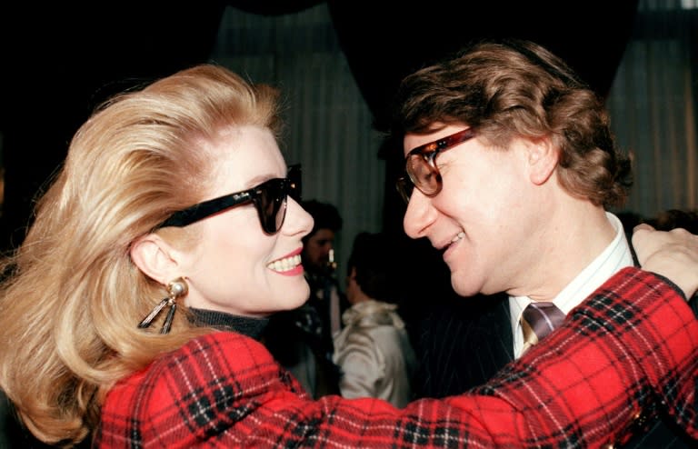 Catherine Deneuve and Yves Saint Laurent, seen here in 1987, were very close with the French actress often seen as a muse for the designer