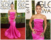 <p><b>Grade: B-</b><br>Tran’s bold pink gown exudes energy — the ruffles we could do without. </p>