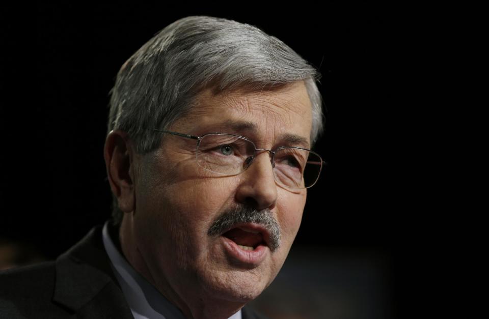 FILE - In this Jan. 15, 2014 file photo is Republican Iowa Gov. Terry Branstad in West Des Moines, Iowa. Iowa's GOP-led House and the Democratic-controlled Senate put Branstad personally in charge of signing off on any payments for publicly funded abortions. About seven months later Branstad hasn't approved any payments but patients eligible for Medicaid-funded abortions received them anyway because the University of Iowa Hospitals and Clinics simply decided not to bill the state for the procedures. (AP Photo/Charlie Neibergall, File)