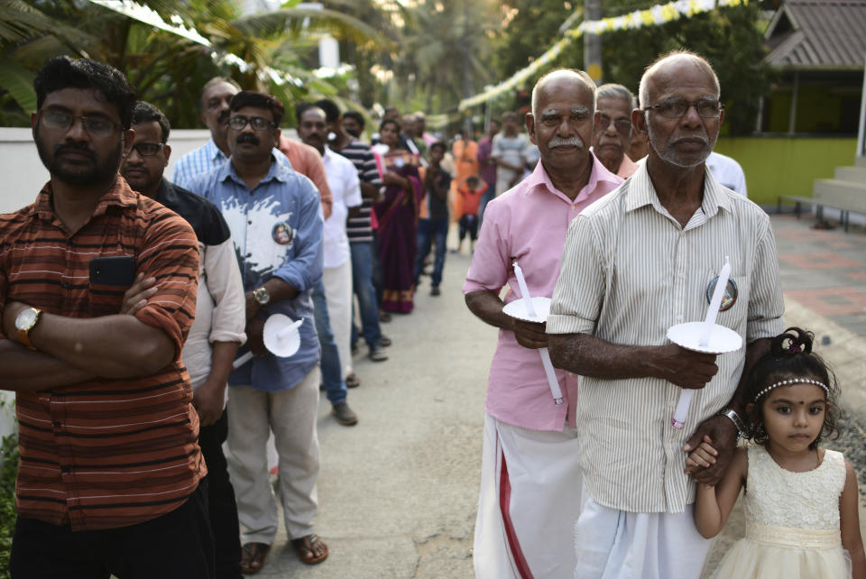 Elderly men, right and the youth participate in a church procession in Kochi, Kerala state, India, March 10, 2023. In this coastal state in India's southern tip, the aging population provides a stark contrast to the young India of the north. The most literate state in India, Kerala is also the fastest aging part of the country. Declining fertility and increasing longevity have been contributing to the demographic shifts in the State. (AP Photo/ R S Iyer)