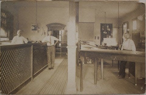 In the Know: A 1912 interior photo of the Lee Clerk’s office has then-deputy clerk Henry Asbury Hendry standing in the center of the room.