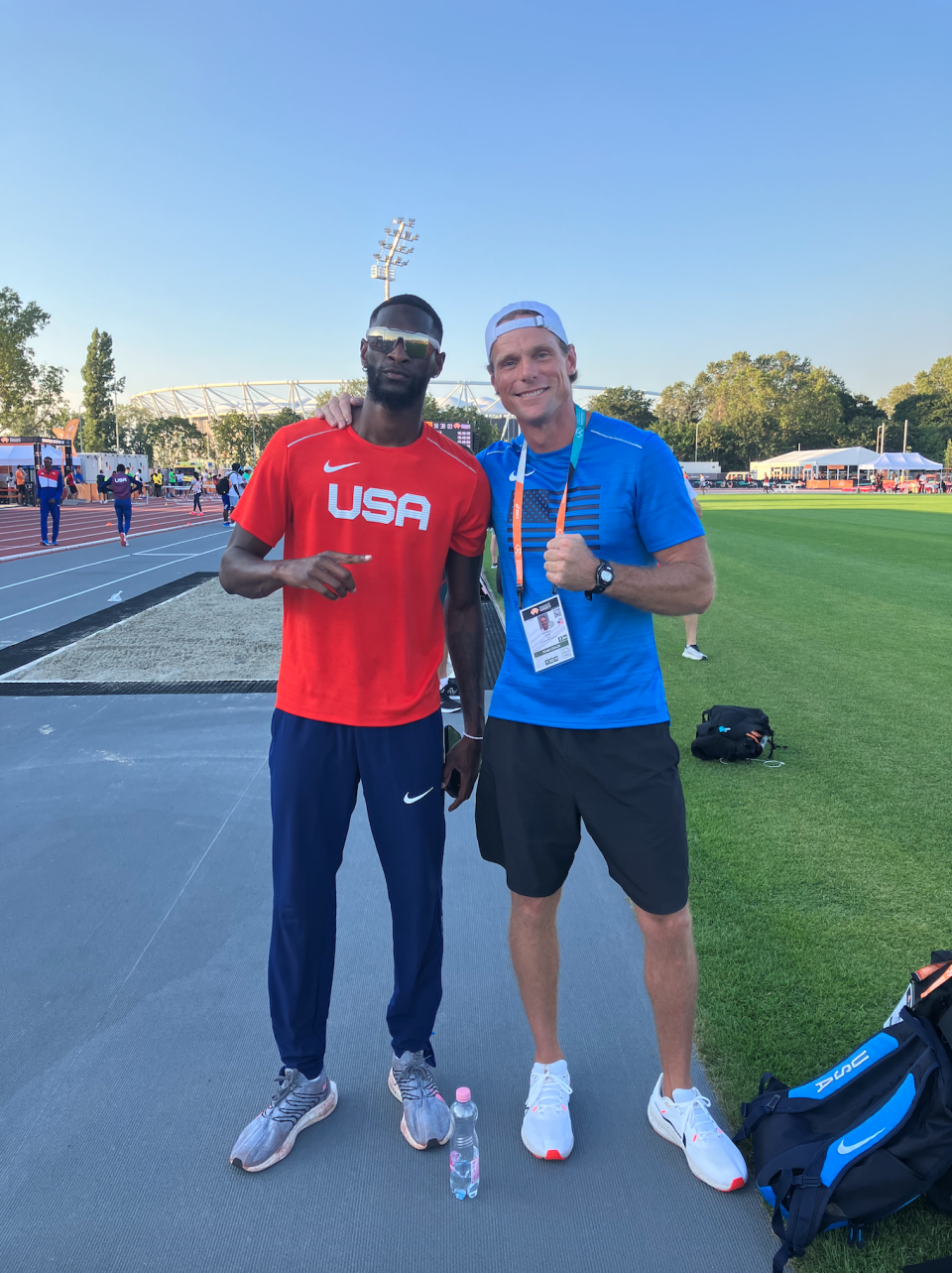 Shelby McEwen (left) and Carlsbad native Patrick Pyle pose at the 2023 World Athletics Championships in Hungary in 2023.