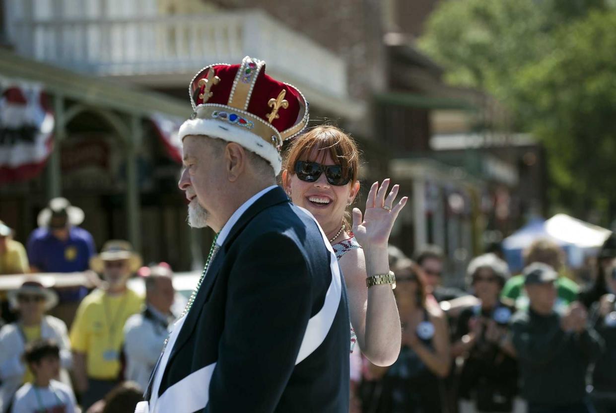 FILE - In this May 26, 2012, file photo, Festival Emperor, Robert Ringwald, of the Fulton Street Jazz Band, rides with his daughter, actress Molly Ringwald, in the Sacramento Music Festival parade in Old Sacramento in Sacramento, Calif. Robert Ringwald, the pianist who played and promoted jazz in California for more than half a century, died Tuesday, Aug. 3, 2021, according to his daughter. He was 80. 