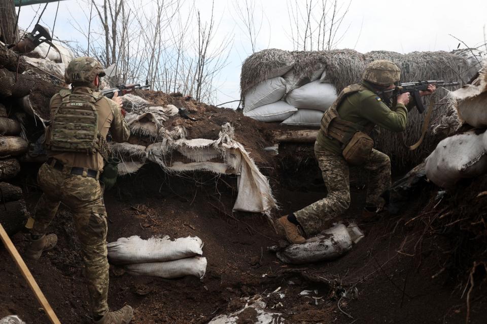 Ukrainian soldiers keep their position in a trench on the front line with Russian troops in Lugansk region on April 11, 2022.