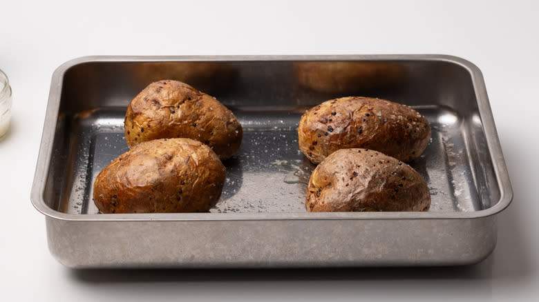baked potatoes in oven sheet