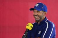 Team Europe's Sergio Garcia smiles as he answers questions during a practice day at the Ryder Cup at the Whistling Straits Golf Course Tuesday, Sept. 21, 2021, in Sheboygan, Wis. (AP Photo/Jeff Roberson)