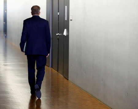 FILE PHOTO: Hans-Georg Maassen, President of the Federal Office for the Protection of the Constitution arrives for a meeting of the parliamentary committee that oversees German intelligence agencies, in Berlin, Germany, September 12, 2018. REUTERS/Fabrizio Bensch/File Photo