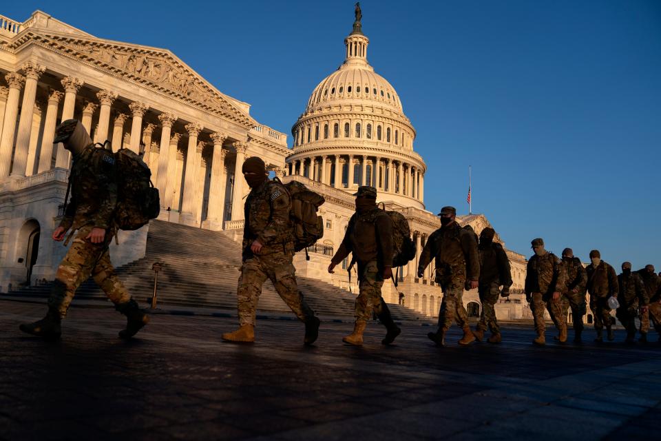 Members of the National Guard gather outside the U.S. Capitol on Jan. 12, 2021 in Washington, DC. Today the House of Representatives plans to vote on Rep. Jamie Raskin's (D-MD) resolution calling on Vice President Mike Pence to invoke the 25th Amendment, removing President Trump from office. Wednesday, House Democrats plan on voting on articles of impeachment. 