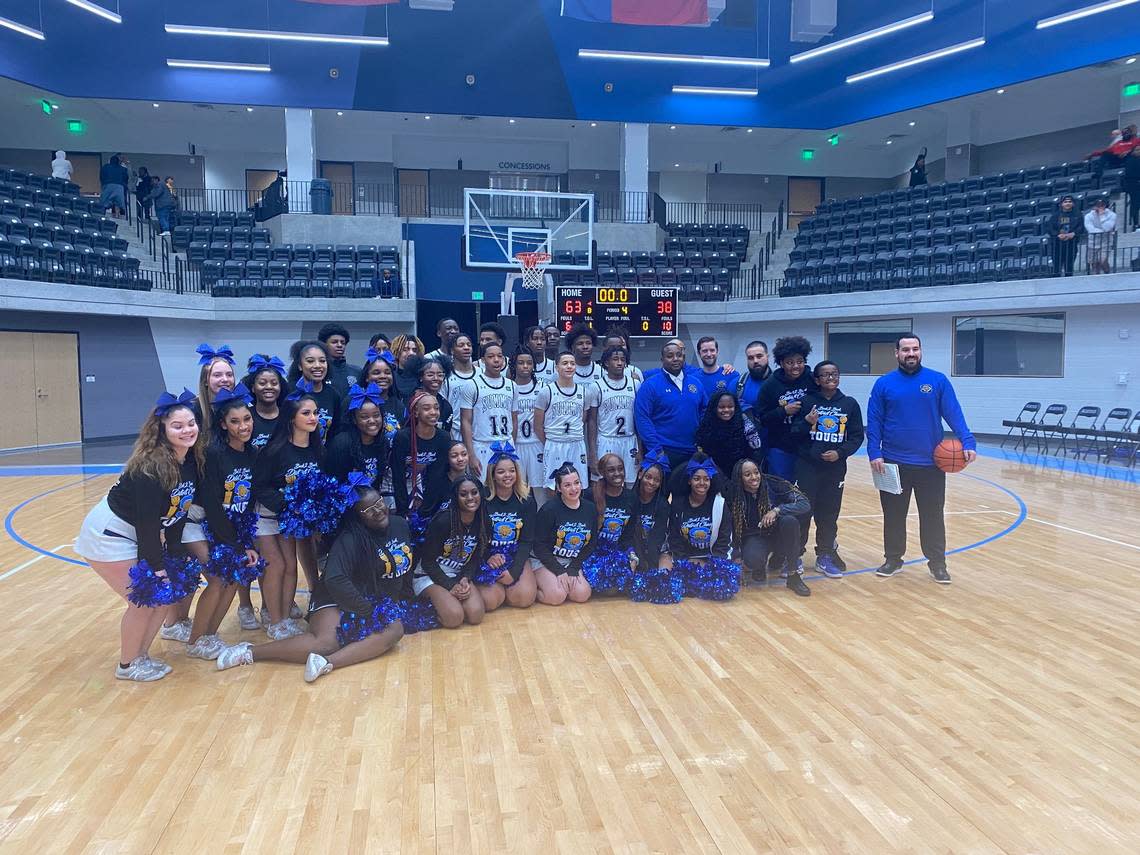 The Mansfield Summit Jaguars posing after winning a 64-38 playoff victory