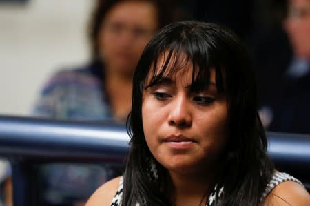 Evelyn Hernandez, who was sentenced to 30 years in prison for a suspected abortion attends a hearing in Ciudad Delgado