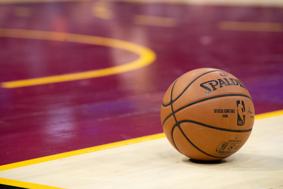 The official Spalding game basketball sits on the court between gameplay during the second half between the Cleveland Cavaliers and the Atlanta Hawks at Quicken Loans Arena on October 21, 2018 in Cleveland, Ohio. The Hawks defeated the Cavaliers 133-111. NOTE TO USER: User expressly acknowledges and agrees that, by downloading and/or using this photograph, user is consenting to the terms and conditions of the Getty Images License Agreement. (Photo by Jason Miller/Getty Images) *** Local Caption ***