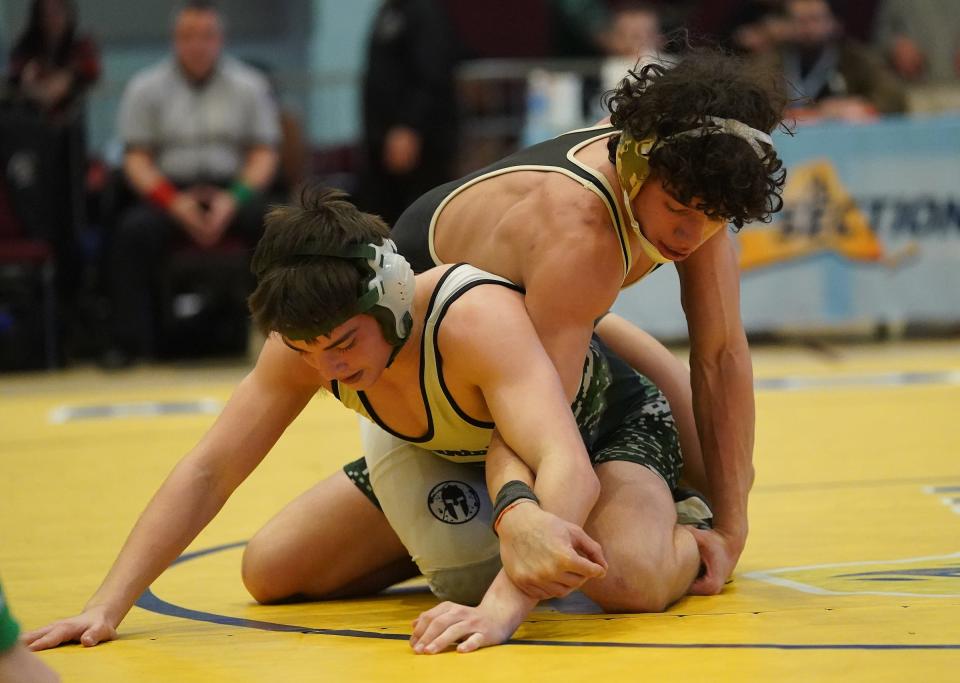 Nanuet's Ethan Badillo wrestles Pleasantville's Ciaran Egan in the 138-pound championship match at the Section 1, Division II wrestling championships at Westchester County Center on Saturday, Feb. 10, 2024.