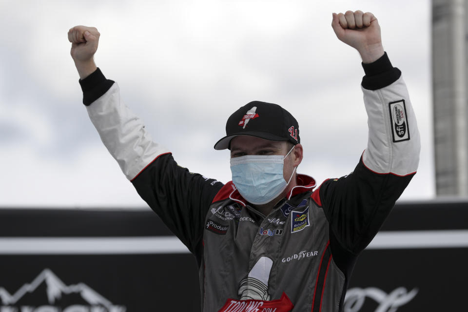 Cole Custer celebrates after winning a NASCAR Cup Series auto race Sunday, July 12, 2020, in Sparta, Ky. (AP Photo/Mark Humphrey)