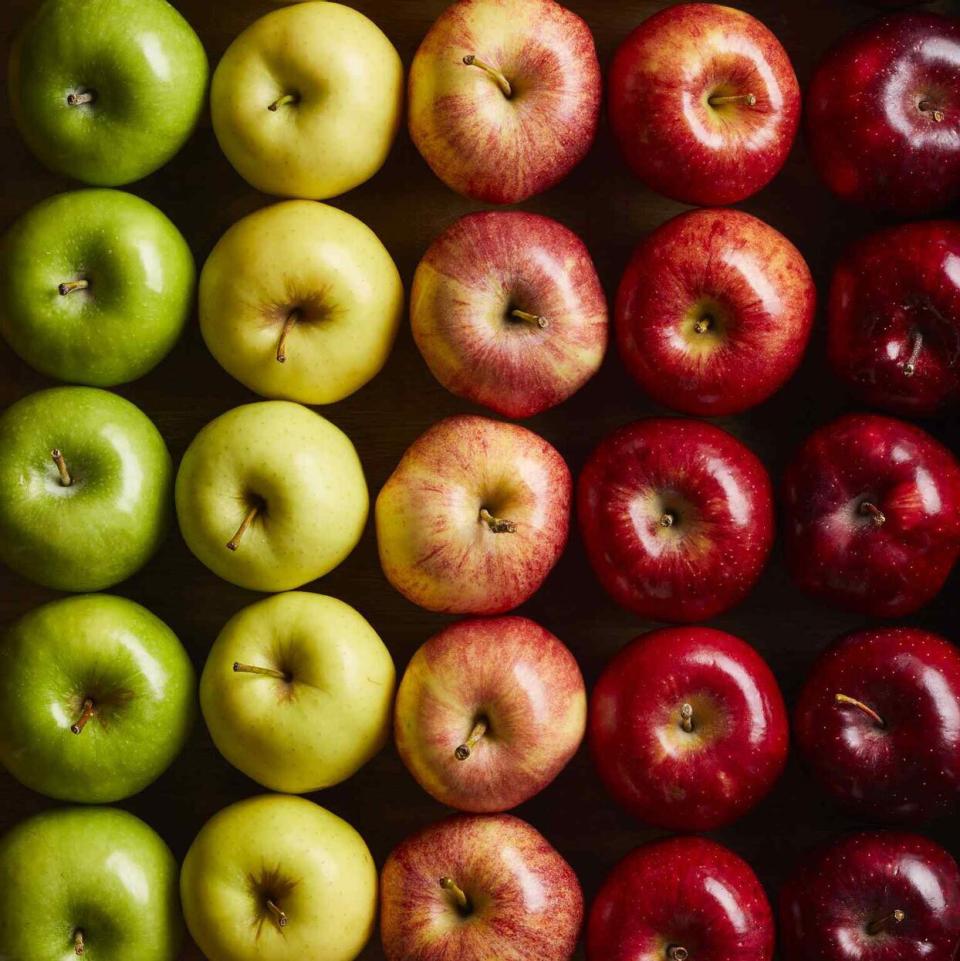 a photo of different kinds of apples