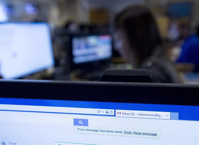 The undo send button is shown on a Gmail account as employees work on their computers in Toronto on Wednesday, June 24, 2015. Gmail has implemented a new feature that allows people to undo a sent email. THE CANADIAN PRESS/Nathan Denette