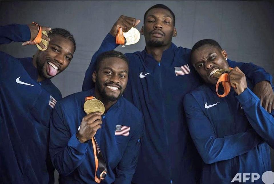 Christian Coleman, Fred Kerley, former Manatee High standout Brandon Carnes, second from left, and Noah Lyles of the USA 4x100 relay team pose with their gold medals after taking first place at the World Athletics Championships on Saturday in Budapest, Hungary.