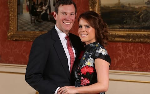 Princess Eugenie and Jack Brooksbank in the Picture Gallery at Buckingham Palace in London after they announced their engagement - Credit: Jonathan Brady /PA