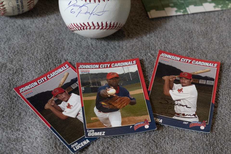 Johnson City Cardinals trading cards are seen at the home of TeriAnn Reynolds Thursday, April 27, 2023, in Johnson City, Tenn. The Reynolds family hosted over 40 minor league baseball players from the team in their home for more than 10 years. (AP Photo/George Walker IV)