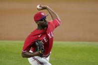 Texas Rangers starting pitcher Taylor Hearn throws to a Chicago White Sox batter during the third inning of a baseball game in Arlington, Texas, Friday, Sept. 17, 2021. (AP Photo/Tony Gutierrez)