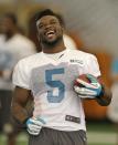 Miami Dolphins running back Damien Williams (5) laughs during NFL football training camp in Davie, Fla., Wednesday, July 30, 2014. (AP Photo/Alan Diaz)