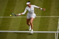 Britain Tennis - Wimbledon - All England Lawn Tennis & Croquet Club, Wimbledon, England - 30/6/16 Spain's Garbine Muguruza in action against Slovakia's Jana Cepelova REUTERS/Tony O'Brien