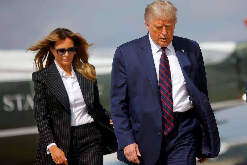 U.S. President Donald Trump and first lady Melania Trump board Air Force One as they depart Washington on campaign travel to participate in the first presidential debate with Democratic presidential nominee Joe Biden in Cleveland, Ohio