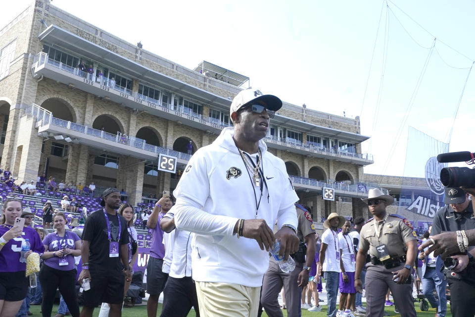 Colorado head coach Deion Sanders walks the field before an NCAA college football game against TCU Saturday, Sept. 2, 2023, in Fort Worth, Texas. (AP Photo/LM Otero)