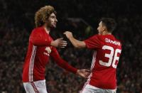 Britain Football Soccer - Manchester United v Hull City - EFL Cup Semi Final First Leg - Old Trafford - 10/1/17 Manchester United's Marouane Fellaini celebrates scoring their second goal with Matteo Darmian Reuters / Phil Noble Livepic