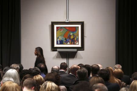 An artwork titled "Strandszene" by artist Wassily Kandinsky is seen during a Christie's auction in New York May 6, 2014. REUTERS/Adam Hunger