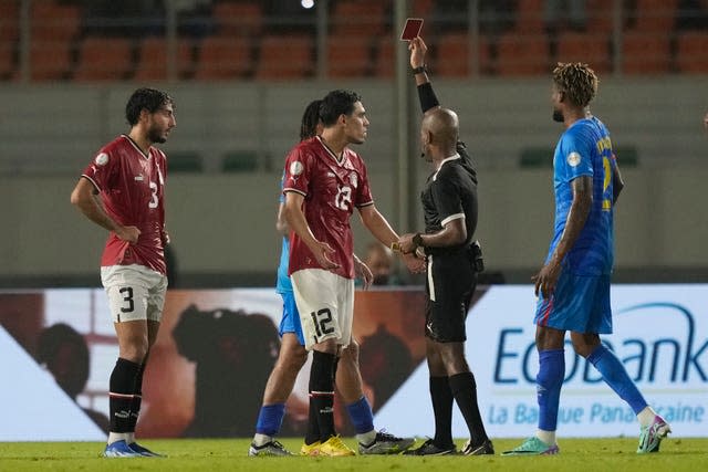 Mohamed Hamdy, centre, is sent off