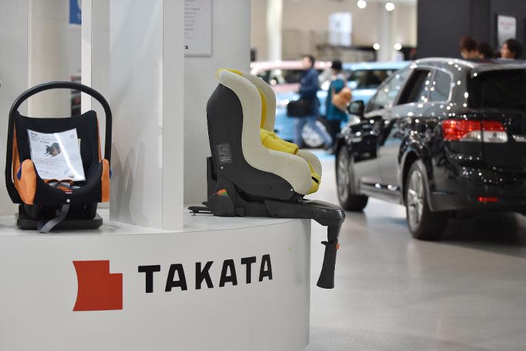 A car showroom for Japanese auto parts maker Takata Corp in Tokyo, where shares in the firm plunged nearly 17 percent on November 10 following calls for a criminal investigation into an airbag defect that has been linked to at least four deaths