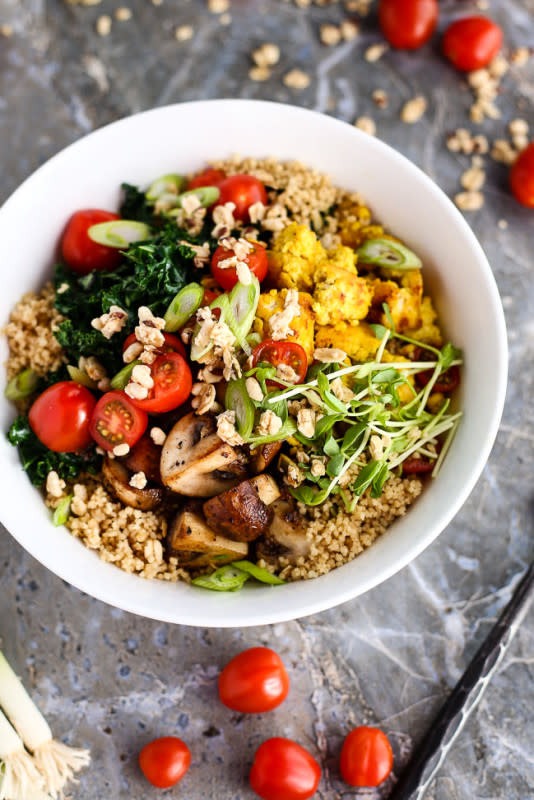 <p>I Love Vegan</p><p>A hearty breakfast bowl of savoury scrambled tofu, garlicky mushrooms and kale on a bed of whole wheat couscous. Add your favourite toppings for a fresh and nutritious breakfast!</p><p><strong>Get the recipe: <a href="https://ilovevegan.com/scrambled-tofu-breakfast-bowl/" rel="nofollow noopener" target="_blank" data-ylk="slk:Scrambled Tofu Breakfast Bowl;elm:context_link;itc:0;sec:content-canvas" class="link ">Scrambled Tofu Breakfast Bowl</a></strong></p><p><strong>Related: <a href="https://www.yahoo.com/lifestyle/40-plant-based-tofu-recipes-191215380.html" data-ylk="slk:40 Plant-Based Tofu Recipes Even Meat Lovers Will Enjoy;elm:context_link;itc:0;sec:content-canvas;outcm:mb_qualified_link;_E:mb_qualified_link;ct:story;" class="link  yahoo-link">40 Plant-Based Tofu Recipes Even Meat Lovers Will Enjoy</a></strong></p>