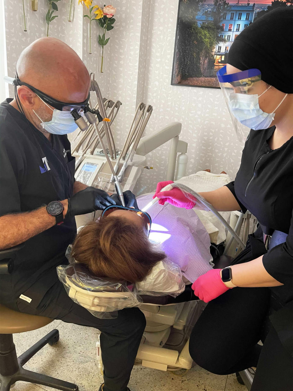 Dr. Ramin Tabib performs a procedure on a patient on June 16, 2021, at NYC Smile Design in New York City. (Courtesy Dr. Ramin Tabib)