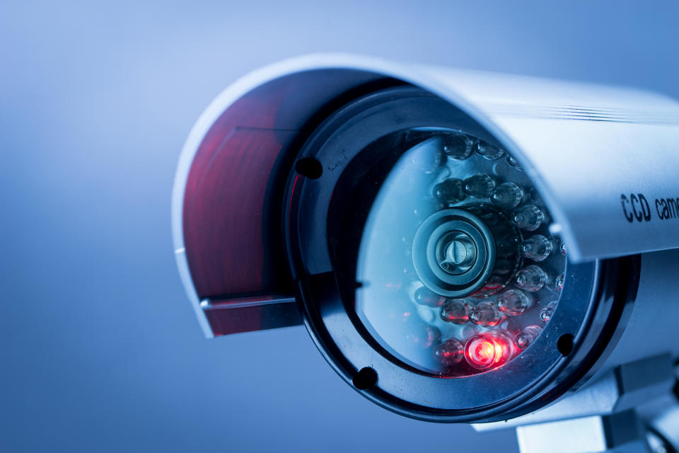 Close-up of the lens of a CCTV camera.