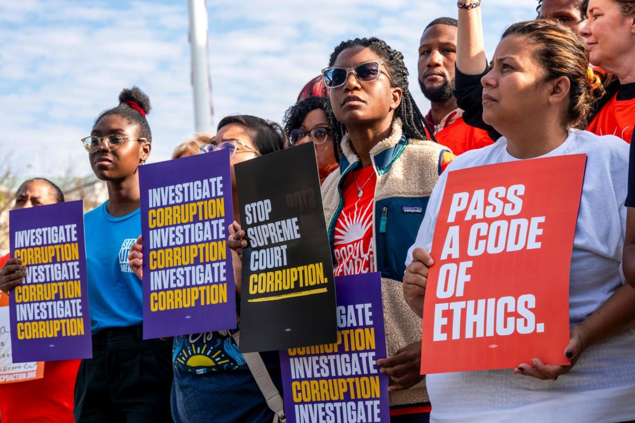 <span>Activists call for the passage of a binding code of ethics for Supreme Court justices in front of the supreme court in Washington DC on 30 October 2023.</span><span>Photograph: Shawn Thew/EPA-EFE</span>