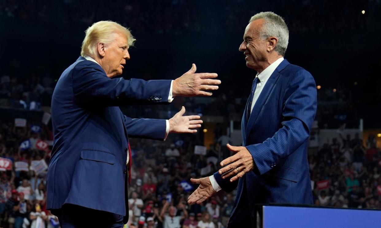 <span>Trump embraces RFK Jr at his rally in Glendale, Arizona on Friday.</span><span>Photograph: Evan Vucci/AP</span>