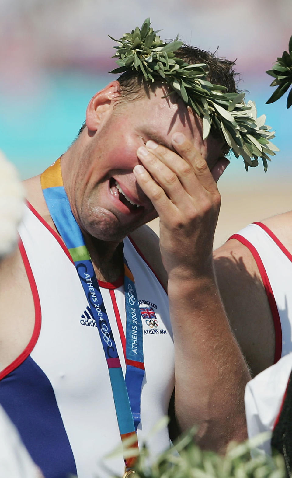 A tearful Matthew Pinsent of Great Britain stands on the podium during the medal ceremony for the men's four event on August 21, 2004 during the Athens 2004 Summer Olympic Games at the Schinias Olympic Rowing and Canoeing Centre in Athens, Greece. (Photo by Shaun Botterill/Getty Images)