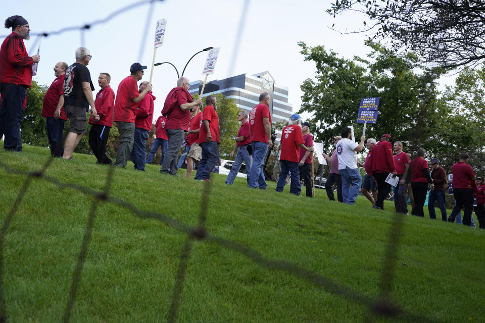 United Auto Workers march outside the Stellantis North American Headquarters, Wednesday, Sept. 20, 2023, in Auburn Hills, Mich. (AP Photo/Carlos Osorio)