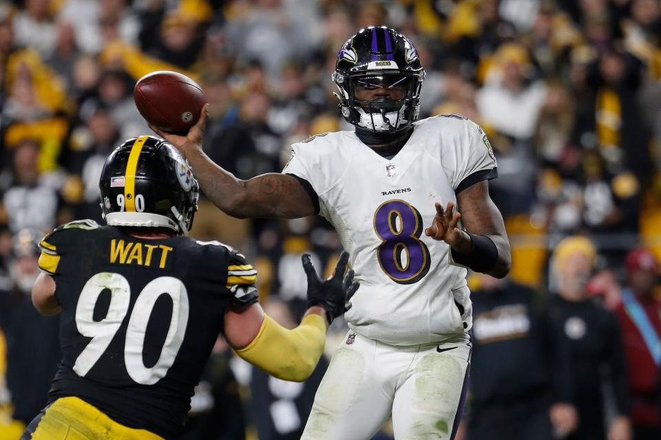FILE - Baltimore Ravens quarterback Lamar Jackson throws a pass gainst the Pittsburgh Steelers during an NFL football game Dec. 5, 2021 in Pittsburgh. Jackson says on Twitter that he loves the Ravens amid uncertainty about his contract status beyond this year. Jackson said Wednesday, March 30, he didn't know who was putting out a "false narrative" that he was having thoughts about leaving. (AP Photo/Winslow Townson, File)