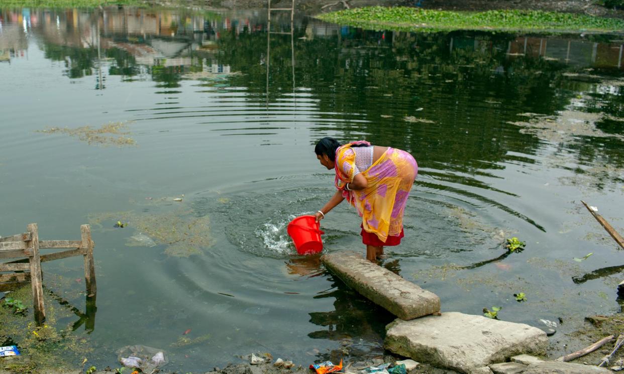 <span>In Dacope village, Bangladesh, about 6,000 people use this pond to collect water for cooking. The rural population relies heavily on rivers, ponds, and groundwater.</span><span>Photograph: Farzana Hossen/The Guardian</span>