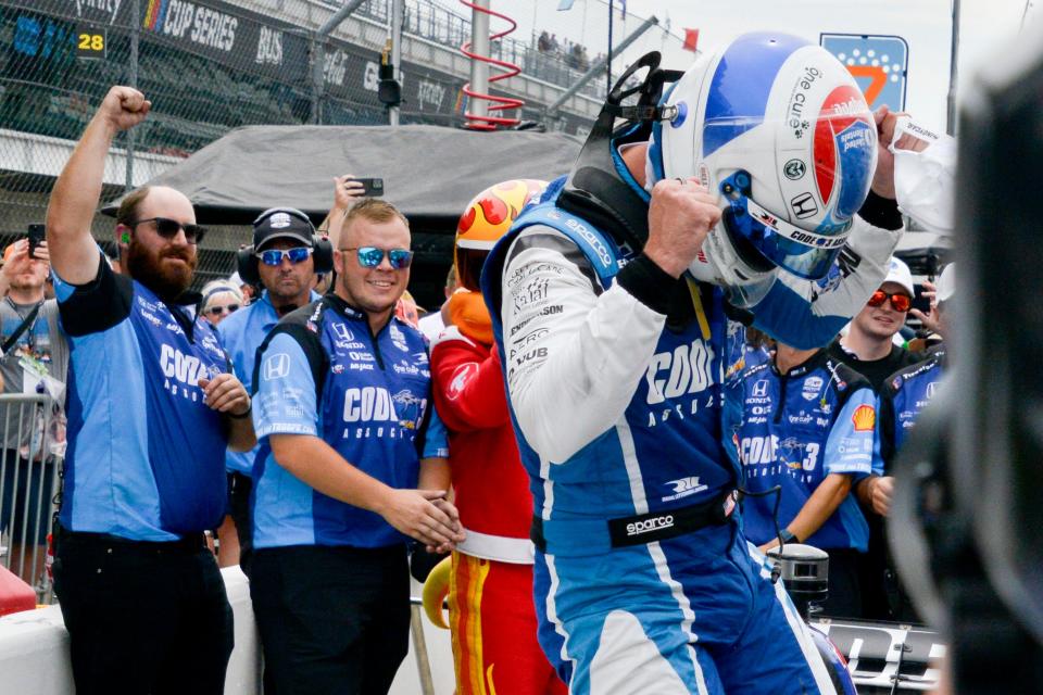 Rahal Letterman Lanigan Racing driver Graham Rahal (15) gets out of his car after earning the pole position Friday, Aug. 11, 2023, during qualifying for the Gallagher Grand Prix at Indianapolis Motor Speedway.