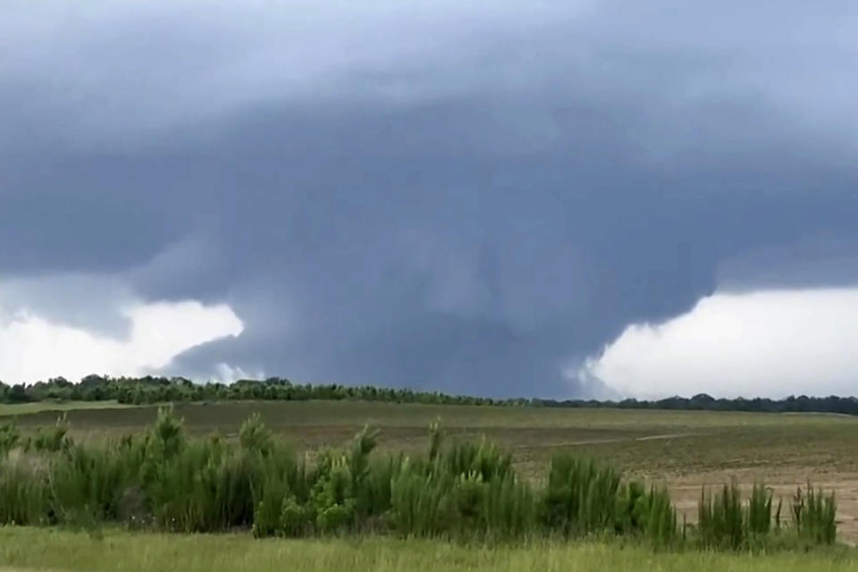 This screenshot taken from a video shows a tornado on June 14, 2023, in Blakely, Ga. Officials from Texas to Georgia are reporting damaging winds and possible tornadoes as a powerful storm system crosses the South. (Rand McDonald / AP)