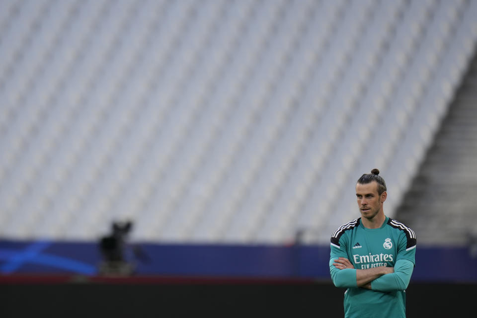 FILE - Real Madrid's Gareth Bale attends a training session ahead of the Champions League final soccer match against Liverpool, at the Stade de France in Saint Denis near Paris, Friday, May 27, 2022. (AP Photo/Manu Fernandez, File)