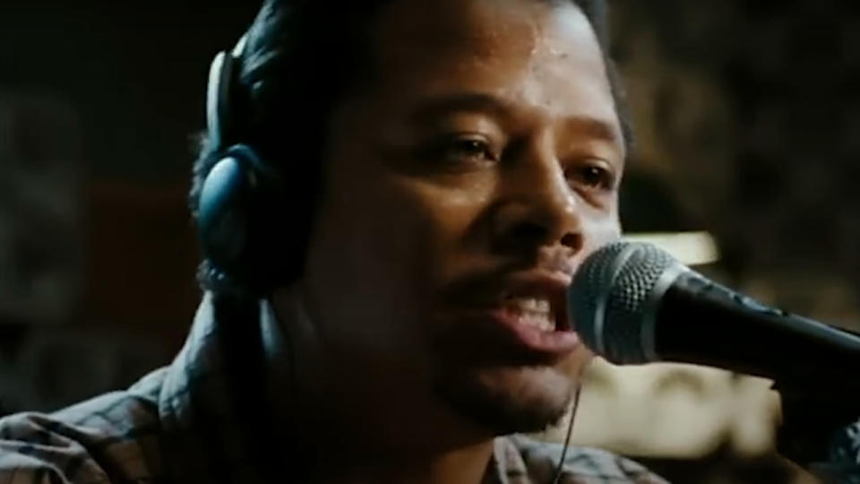 Terrence Howard raps on the mic in Hustle & Flow.