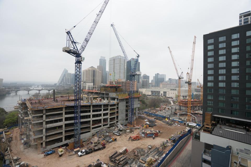 Towers being built in the Rainey neighborhood will bring thousands of additional residents into the district, which is just one-tenth of a square mile.