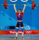 Marina Shainova of Russia lifts 129kg in the women's 58kg Group A clean and jerk weightlifting competition at the Beijing 2008 Olympic Games August 11, 2008. REUTERS/Yves Herman